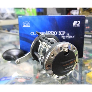 OKUMA CLASSIC PRO XP 302La รอกเบทหมุนขวา มีตัวเกลี่ยสายใช้งานง่าย