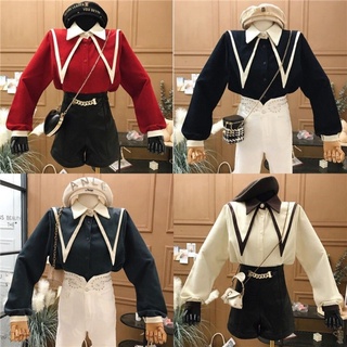 เสื้อเชิ้ตปีใหม่สีแดงคอปกแหลมขนาดใหญ่สีออกแบบวินเทจแบบใหม่2021เสื้อตัวในแขนยาวสำหรับฤดูใบไม้ร่วงและฤดูหนาวสำหรับผู้หญิงฤ