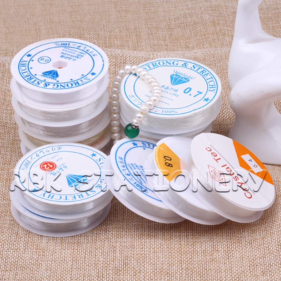 เอ็นยืด เอ็นยืดร้อยลูกปัด เอ็นร้อยลูกปัด ฉลากส้ม ฉลากขาว อุปกรณ์ร้อยลูกปัด อุปกรณ์ DIY อุปกรณ์ร้อยสร