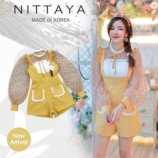 งานป้าย NITTAYA การันตีเสื้อผ้าคุณภาพ จั้มสูทขาสั้นสีเหลือง แขนพองปลายแขนมีกระดุม