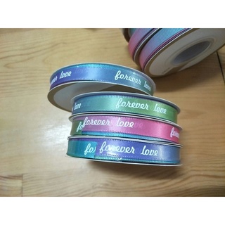 ริบบิ้นสีรุ้งมีแบบพิมพ์ลาย forever love กับสีรุ้งไม่พิมพ์ ยาว 25 หลา ม้วนละ 45บาท