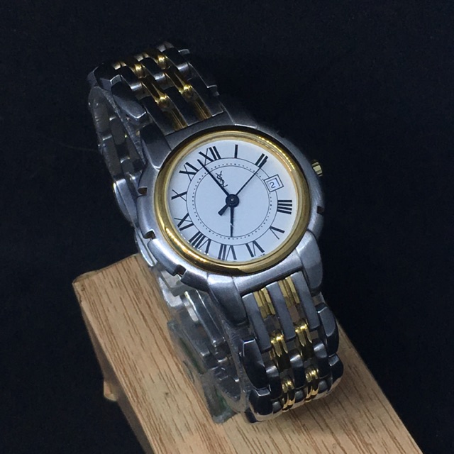 YVES SAINT LAURENT GOLD/SILVER WHITE DIAL DATE QUARTZ SWISS MADE LADY'S WATCH