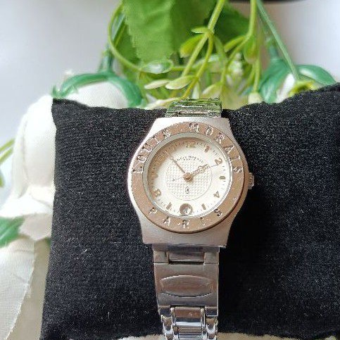นาฬิกาแบรนด์เนมlouis Morais paris หน้าปัดสีขาวช่องวันที่ สายสแตนเลสของแท้มือสองสภาพสวย