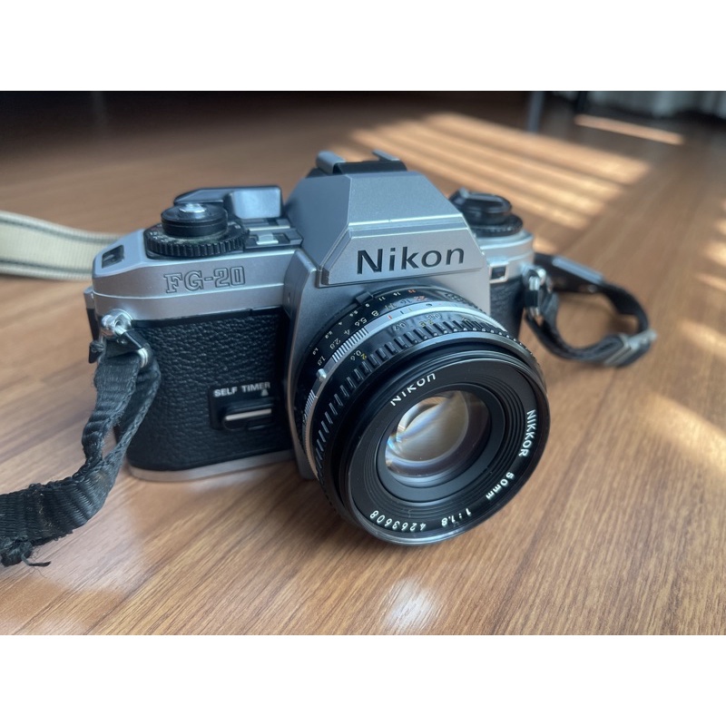 กล้อง Nikon FG-20 is มือสอง พร้อม เลนซ์ 50mm. f1.8 (กล้องฟีล์ม)(ใช้งานได้)