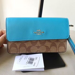 กระเป๋าคลัทช์ Coach แท้ ใหม่ FOLDOVER WRISTLET IN SIGNATURE CANVAS (COACH 78229) คล้องมือ