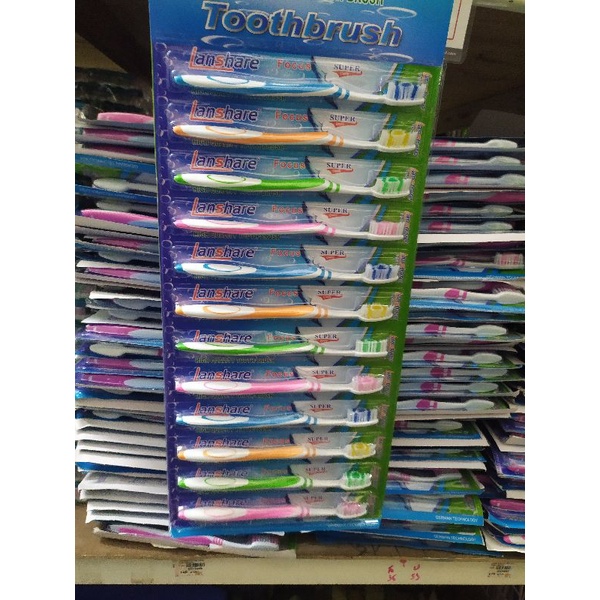 แปรงสีฟัน 12ชิ้น แบบแผงคละสี