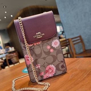 COACH F76988 NORTH/SOUTH PHONE CROSSBODY IN SIGNATURE CANVAS WITH PRAIRIE DAISY CLUSTER PRINT