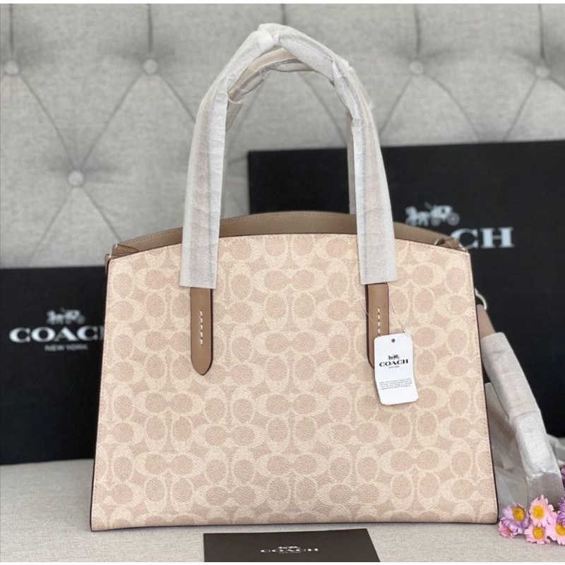 Coach Charlie Carryall In Signature Canvas