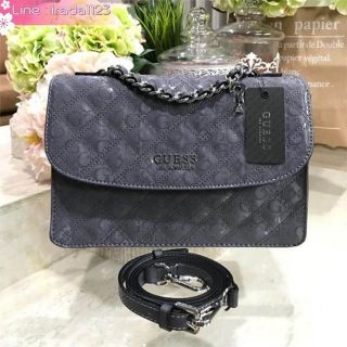 GUESS WOMAN’S LOGO EMBOSSED CROSSBODY FLAP  ของแท้ ราคาถูก