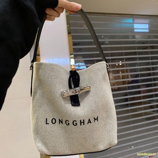 🚛ส่งเร็ว#🌼ใหม่ Longchamp Bamboo Canvas Bucket Bag Women s Handheld One-shoulder Slanting Bag Style