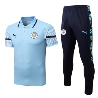 [พร้อมส่ง] เสื้อโปโลแขนสั้น กางเกงขายาว ลาย Manchester City สีฟ้าอ่อน สําหรับผู้ชาย ไซซ์ S-2XL 22-23