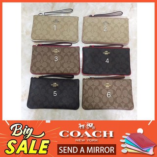 พร้อมที่จะจัดส่ง! แท้💯% โค้ชCoach Coach Signature PVC Large Wristlet รุ่น F58695 สี: Saddle 2 (น้ำตาล) คล้องมือ L 1ซิป