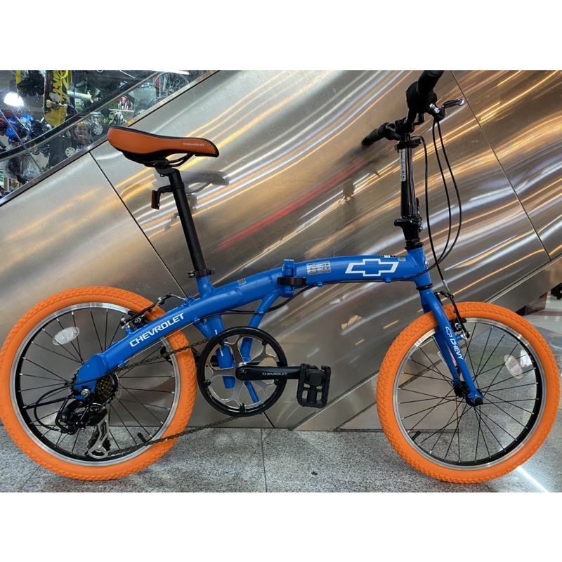จักรยานพับ Chevrolet FK207 เฟรมอลูมิเนียม ดีไซน์เท่ห์ไม่เหมือนใคร ยางนอกสีส้มตัดกับเฟรมสีฟ้าด้าน เท่ห์สุดๆ