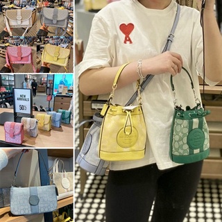 USA outlet สินค้าพรีออเดอร์Coach C8322 Dempsey สีมาการอง กระเป๋าถังหูรูดขนาดเล็ก สุภาพสตรี กระเป๋าสะพายข้าง