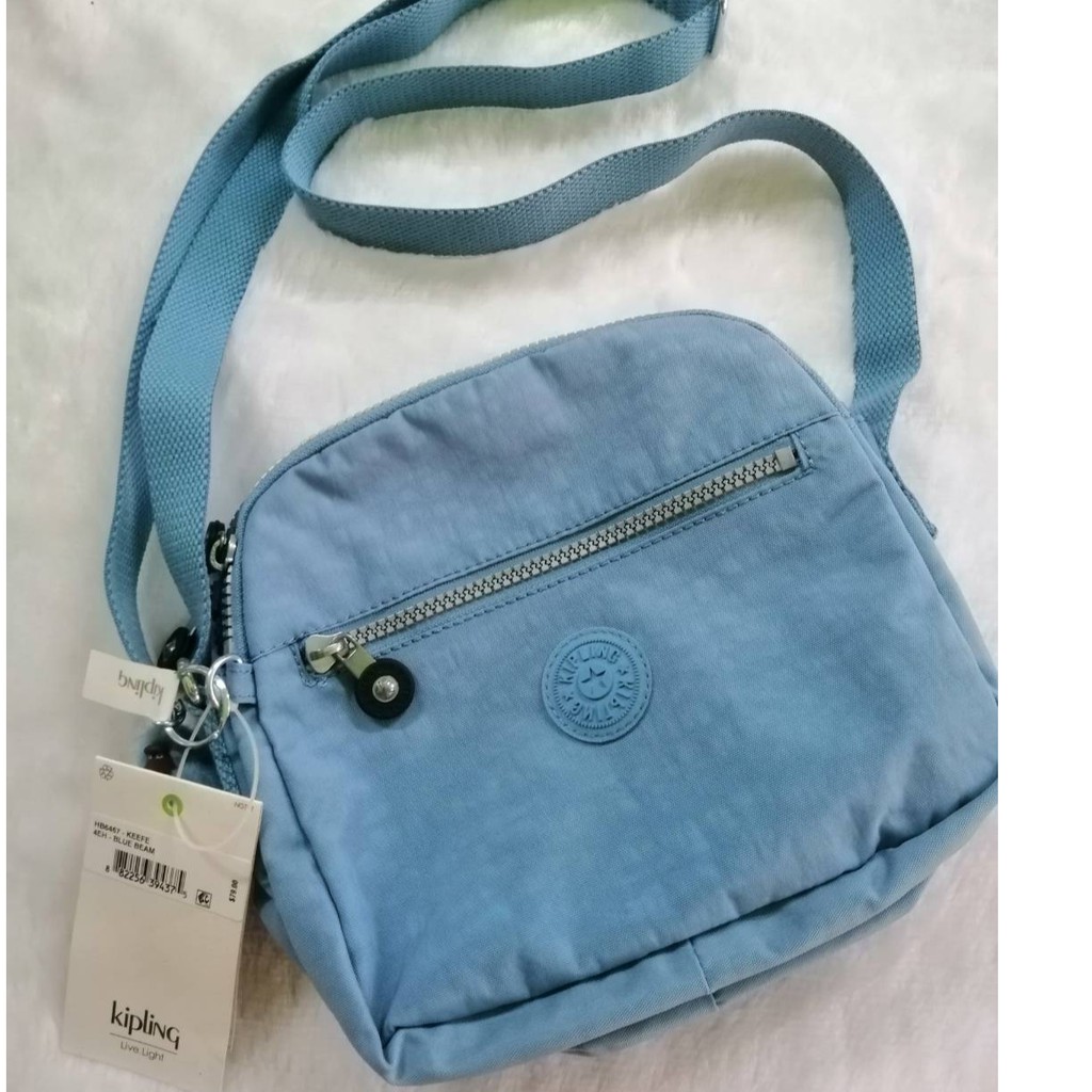 Kipling กระเป่าสะพายคิปลิ้ง คอร์สบอดี้ สีสวยละมุน Kipling HB6467 - Keefe สี Blue beam