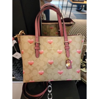 พร้อมส่ง แท้ 🇺🇸💯% New Coach MOLLIE TOTE 25 IN SIGNATURE CANVAS WITH STRIPE HEART PRINT (CA252)