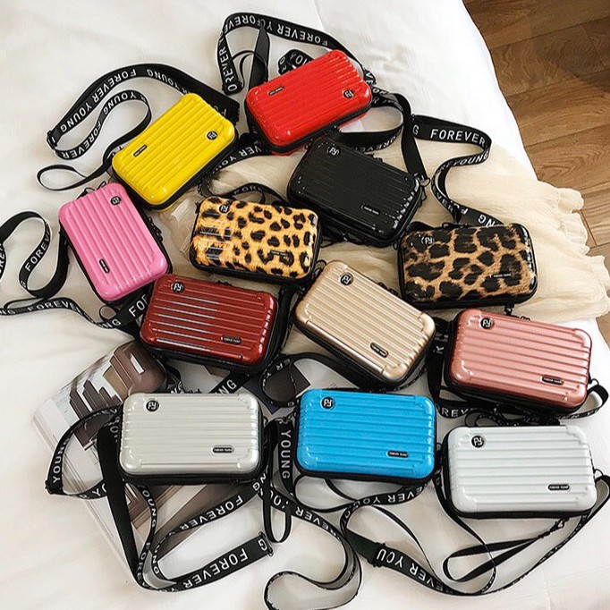 (BAGBLISSS) กระเป๋าสะพายข้างทรงกล่อง (ไซส์ใหญ่/เล็ก สีลาย) กระเป๋าเดินทางมินิ Forever Young