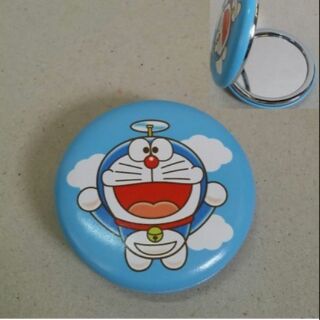 กระจกพับ สำหรับพกพา มีลายสกรีน 2 ด้านค่ะ (ลายเดียวกัน) ลาย โดราเอม่อน Doraemon ขนาดเส้นผ่าศูนย์กลาง 7 cm