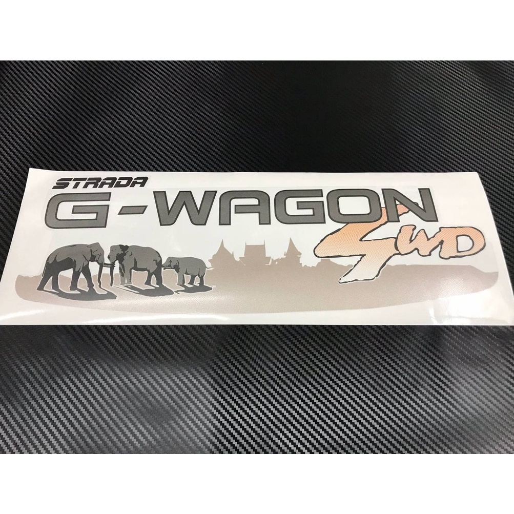 สติ๊กเกอร์แบบดั้งเดิม ติดรถ MITSUBISHI STRADA G-WAGON 4WD ติดฝาครอบล้ออะไหล่ คำว่า STRADA G-WAGON 4WD ลายช้าง ช้าง stick