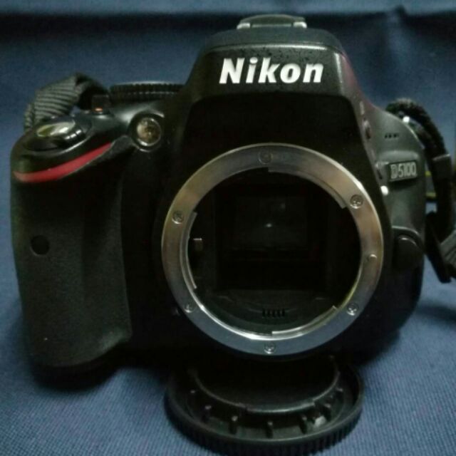 Nikon D5100 + 18-55mm