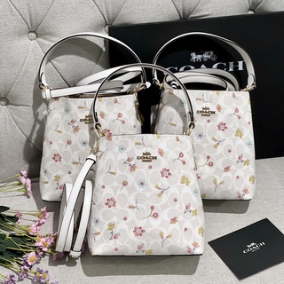 🦋แท้💯 พร้อมส่ง🦋 SMALL TOWN BUCKET BAG IN SIGNATURE CANVAS WITH MYSTICAL FLORAL PRINT (COACH C8610)