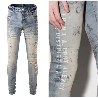 29 พร้อมส่ง AMIRI print paint graffiti ripped hole old elastic slim-fit washed light-colored jeans men