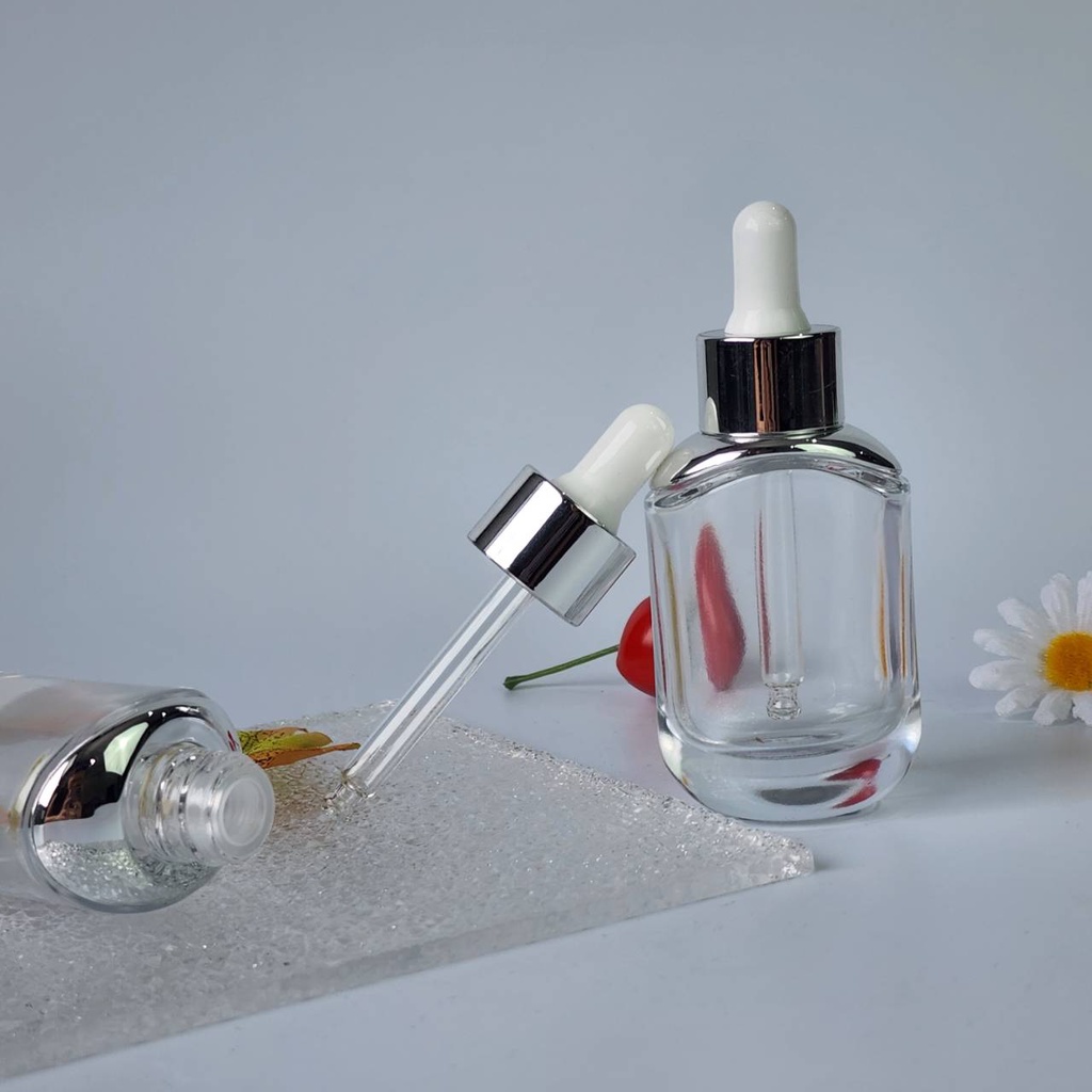 ขวดแก้วดรอปเปอร์สีใส 30ml. ทรง Dior (ไหล่เงิน) ฝาเงินจุกขาว งานเค้าท์เตอร์ หนา แข็งแรง ทรงรี หน้ากว้าง ดูดีสุดๆ