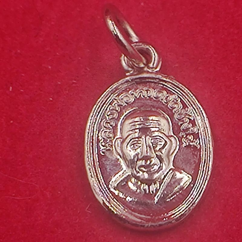 เหรียญหลวงปู่ทวดพิมพ์เม็ดแตงหลังอาจารย์ทิมปี 2555