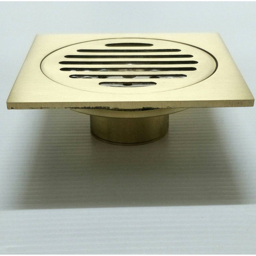 ที่กันกลิ่นทองเหลืองบนพื้นห้องน้ำ (Floor Drain) แบบอัตโนมัติ