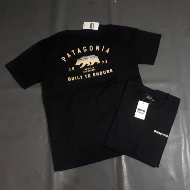 เสื้อยืดแขนสั้น ผ้าฝ้าย พิมพ์ลาย Patagonia แฟชั่นคู่รัก สําหรับผู้ชาย และผู้หญิง