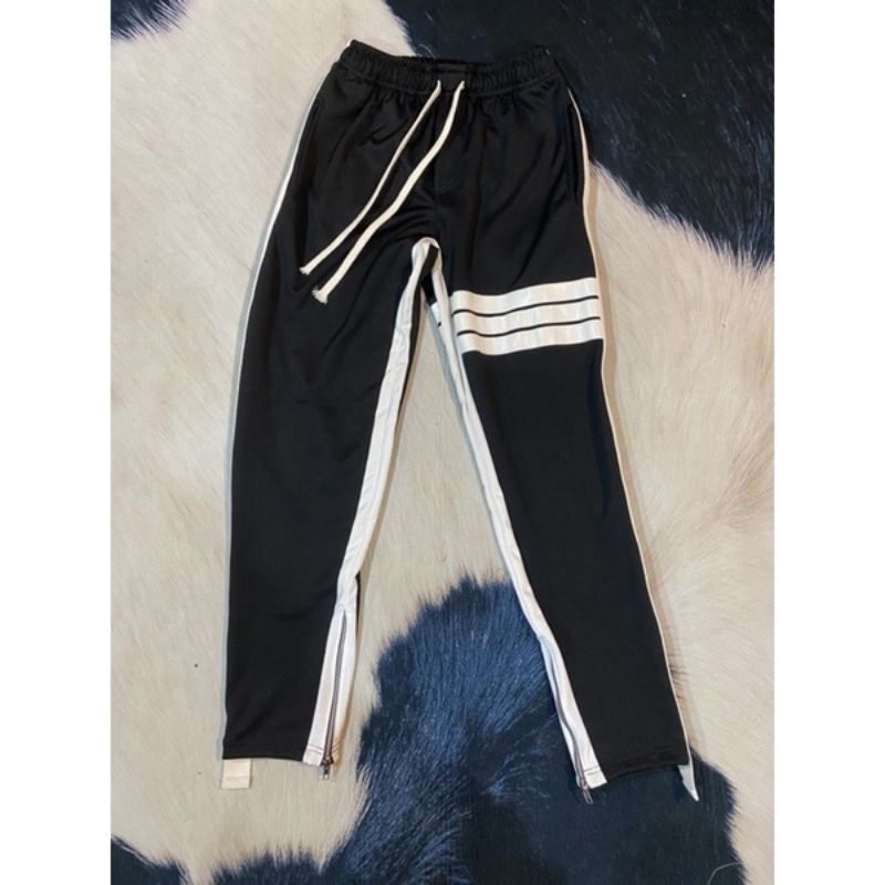 กางเกงวอร์มสามแถบหนังสีขาวมีซิปปลายขา กางเกงแฟชั่น  world Street
