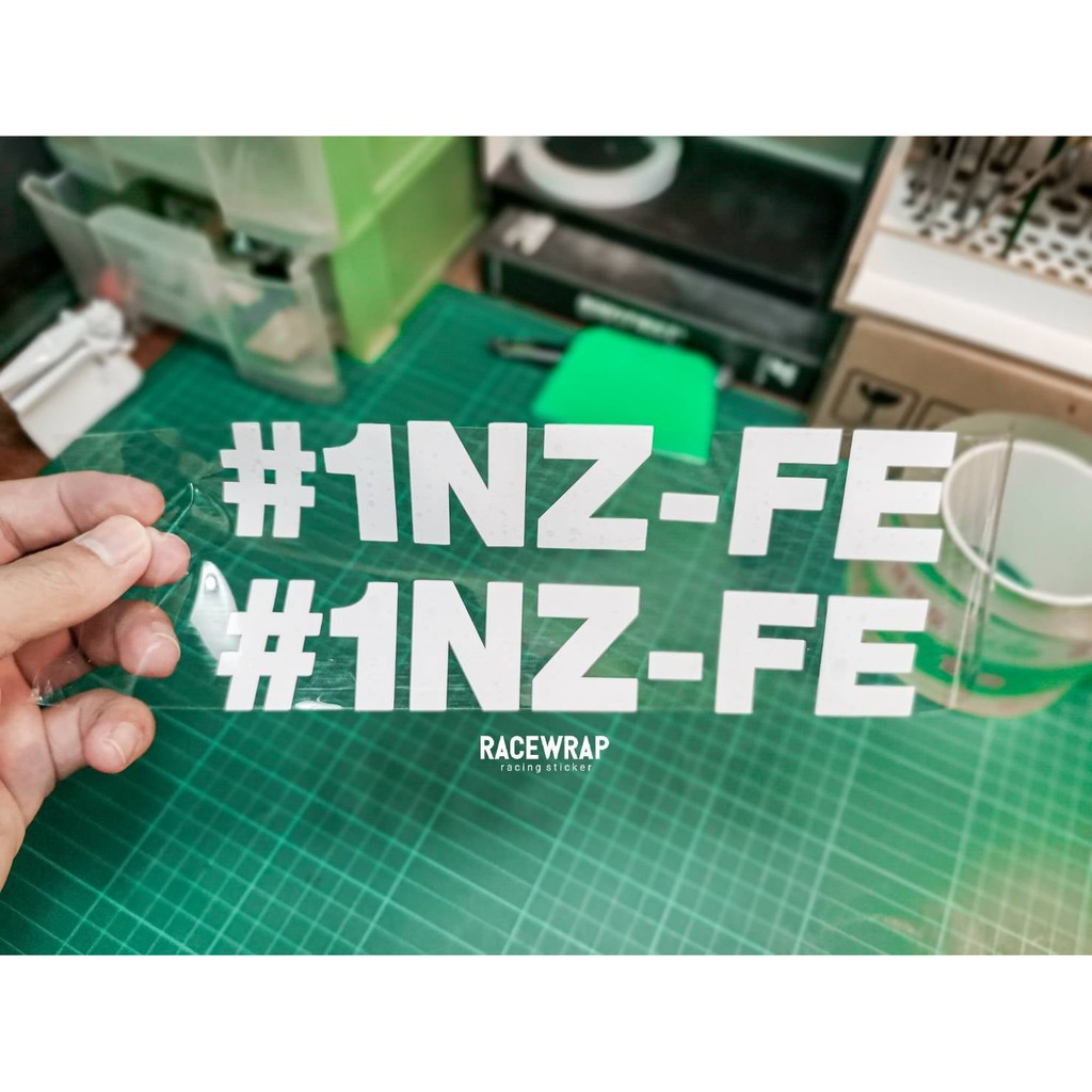 สติกเกอร์ " 1nz-fe " ใช้ติดขอบกระจก toyota เช่น vios yaris ปีเก่าที่เป็นเครื่อง 1.5 สติกเกอร์แต่งรถ สติกเกอร์ซิ่ง