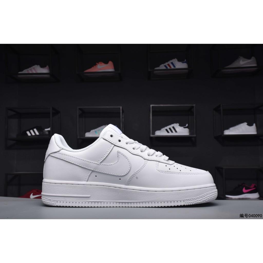 black air forces gold tick