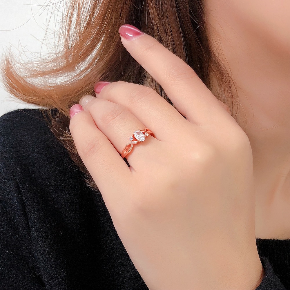 ZHOUYANG แหวนแต่งงานสำหรับผู้หญิงที่เรียบง่ายหยักรูปทรงสี่ Claw รี Cubic Zirconia Rose Gold พรรคสีของขวัญเครื่องประดับแฟชั่น R785