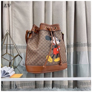 กระเป๋า GUCCI X DISNEY Mini Vintage GG Supreme Monogram Bucket Bag Brown