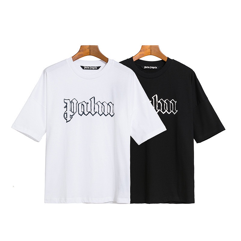 Street แฟชั่น 9AL7M ผ้าฝ้ายผู้ชายและผู้หญิงเสื้อยืดภาษาสันสกฤตตุ๊กตาแขนสั้นเสื้อหลวมเสื้อลําลอง Unisex