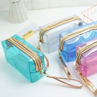 กระเป๋าเครื่องสำอางใส Holographic PVC กันน้ำ Transparent PVC makeup bag waterproof.