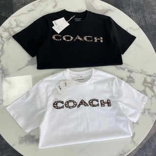 Coachi เสื้อยืดลําลอง ผ้าฝ้าย แขนสั้น คอกลม พิมพ์ลายโลโก้ ขนาดใหญ่ แฟชั่นสําหรับผู้ชาย และผู้หญิง