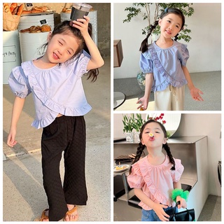 เสื้อลูกไม้แขนสั้นเด็กผู้หญิง    2022 ฤดูร้อนเด็กใหม่เวอร์ชั่นเกาหลีของแขนพัฟสไตล์ต่างประเทศใบบัวตุ๊กตาเสื้อtop