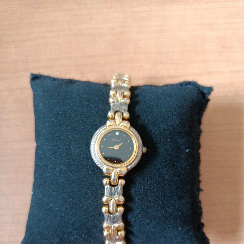 นาฬิกาแบรนด์เนมOrientหน้าปัดสีดำ ขอบทอง สายสแตนเลส 2 กษัตริย์ ของแท้ 100% มือสองสภาพสวย