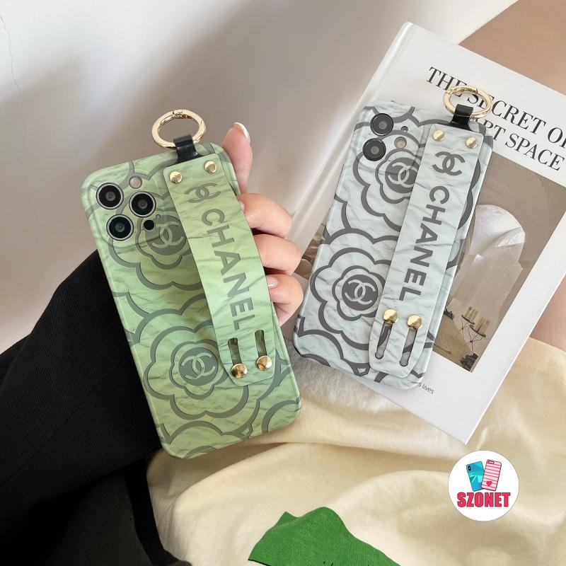 เคสโทรศัพท์มือถือ ลายดอกคามิเลีย พร้อมสายคล้องข้อมือ ป้องกันกล้อง สําหรับ iPhone 14 13 12 11 Pro Max Plus