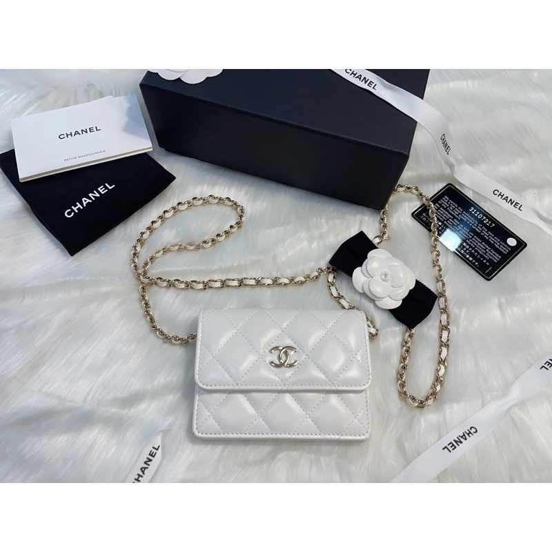 Used like very new Chanel card holder xl on chain with camellia bow Lghw Holo 31