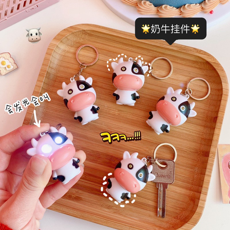 วัว led เสียงลูมินัสรุ่น Q จี้วัวพวงกุญแจวัวอุปกรณ์เสริมโทรศัพท์มือถือเปลือกโทรศัพท์มือถือส่องสว่าง
