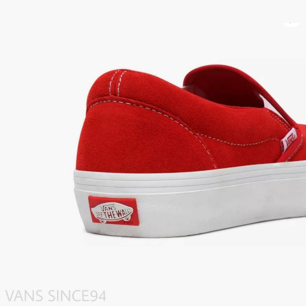 red and white slip ons