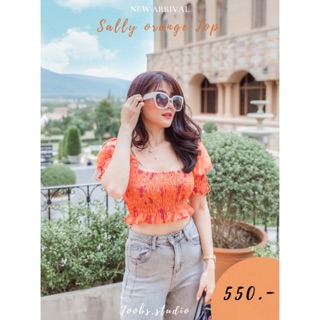 Sally orange Top....