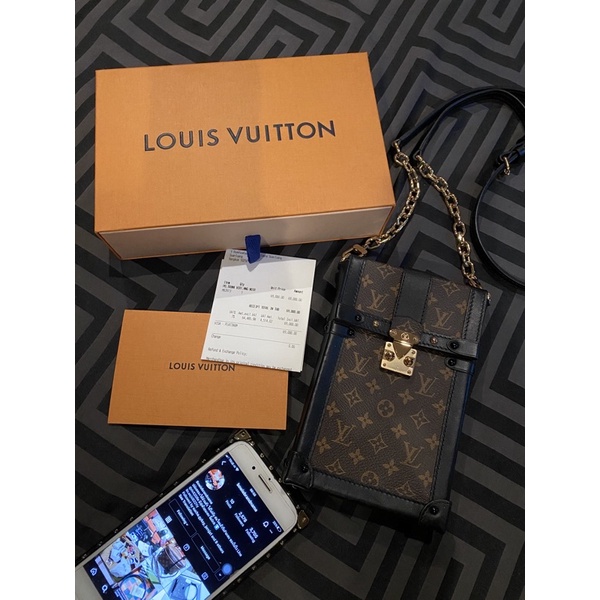 used LV vertical trunk pochette