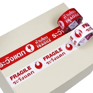 พร้อมส่ง สก็อตเทป กว้าง 2นิ้ว เทปกาวพิมพ์ระวังแตก หน้ายิ้ม เทปกาวลายคิตตี้ ที่ปิดกล่อง ติดกล่อง