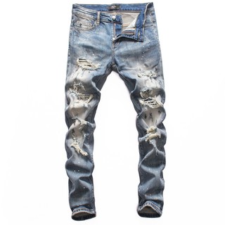 Amiri Slim Old Washed Hole Patches  Jeans