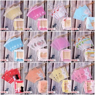 ถุงขนมฝากาว โค้ดลด INC263PO ขนาด 10*10+3 cm.ลายน่ารัก มีลายเยอะมากแพ็ค 100 ใบ ฮาโลวีน ซานต้า คริสมาส