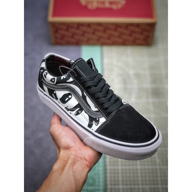 black low cut vans